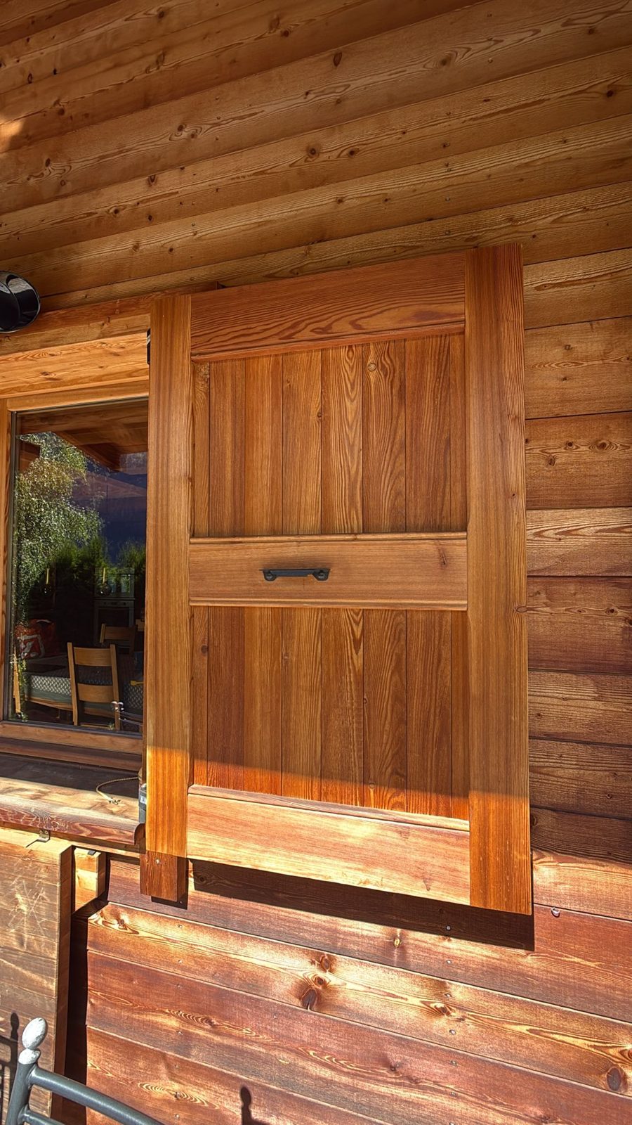 One of the wooden blinds