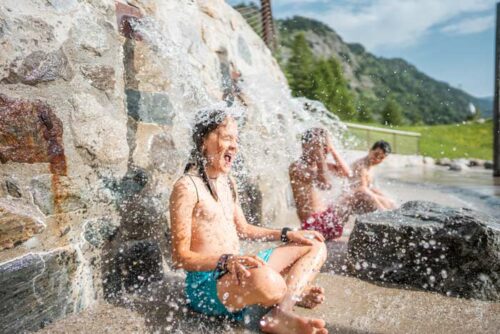 Kids playing in the water area at Le Collet, Vaujany